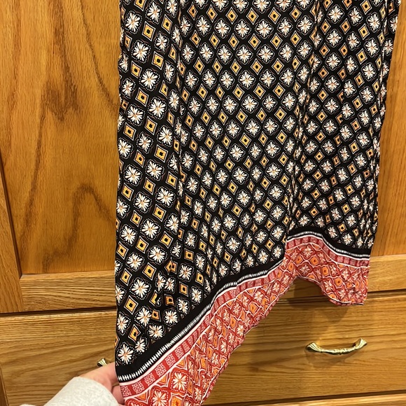 Black dress with white orange and red details. - Picture 2 of 2